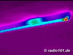 Fluorescent lamp (warm ends an warm hot ignition coil are visible), infra red image (W&auml;rmebild, thermography)